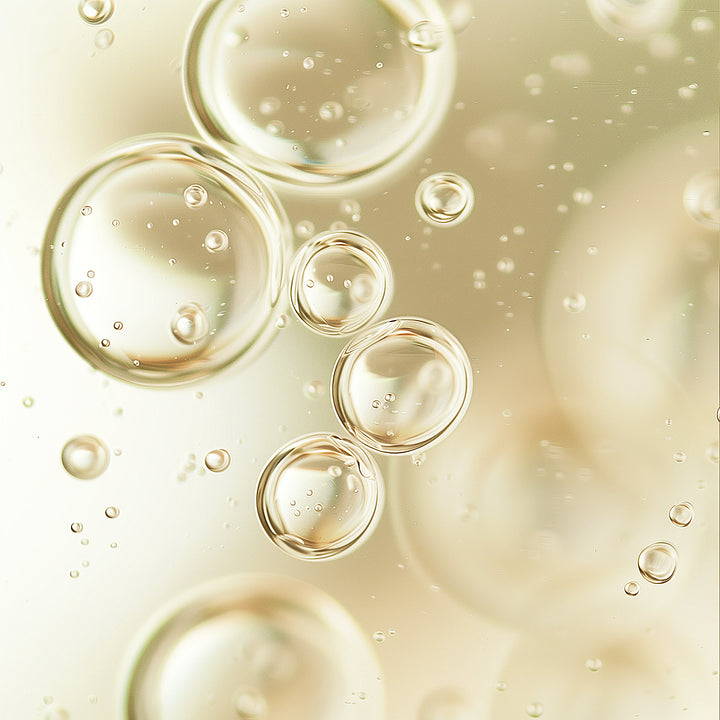 Close Of Bubbles of Nourishing Jojoba Face Oil By Blush And Bloom Care US