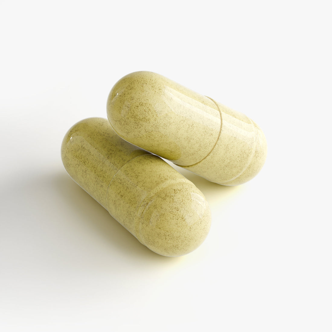 Two green capsules Of NAD+ Suppliment Byh Blush And Bloom Care Beauty Store USA